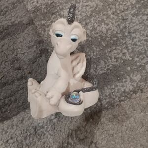 White Dragon Figurine with Blue Accents